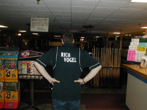 Back shot of new shirt, showing the embroidery of the name.